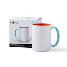 CC-2009396 2009396 - Cricut Beveled Ceramic Mug Blank Sahara 1pc 425 ml; 1 Infusible Ink™ compatible* mug blank 15 oz / 425 ml; Bold pop of color; Smooth, straight pressing area for flawless transfers; Dishwasher & microwave safe; For use with Cricut Mug Press™ & Infusible Ink products (sold separately); Includes 1 ready-to-gift box for any occasion - Image 1