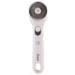 2004669 - Cricut Rotary Cutter (45mm); 45 mm premium carbon alloy steel rotary blade delivers crisp, controlled cuts on a wide variety of materials; Sliding quick-release blade cover for safety when not in use; Symmetrical handle for right- or left-handed users