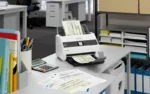 Epson WorkForce DS-730N Network Scanner; Standalone network scanning - A4, A3 with stitching function, SheetFeed Scanner, 600 dpi x 600 dpi (Horizontal x Vertical), Mono 40ppm / Colour 40ppm, 100 sheets, 4500 page Daily Duty Cycle, 27g-413g Media, USB 2.0 Type B, Ethernet Interface (1000 Base-T/ 100-Base TX/ 10-Base-T), Single-Pass Dual-Scanning. What's in the box: AC adapter, Driver and utilities (CD), Main unit, Power cable, Setup guide, USB cable, Warranty card; Warranty 1 Year Carry-In